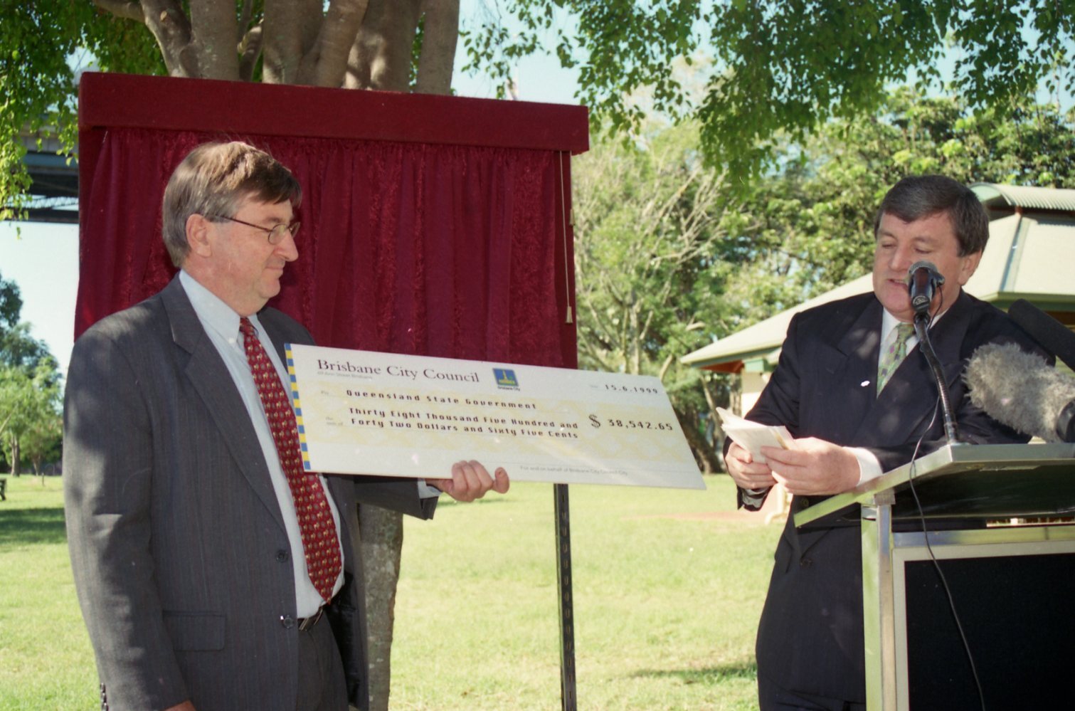 Lord Mayor Jim Soorley Presenting Final Payment on Story Bridge Loan to State Government Minister in Captain Bourke Park - Kangaroo Point.