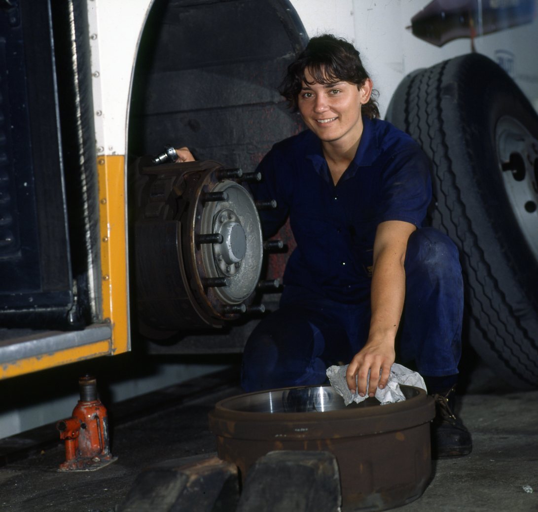 Bus being Serviced by Female Mechanic - 1995