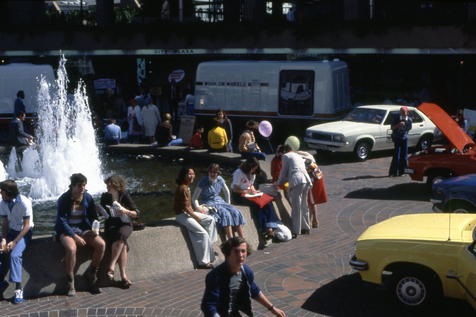 People Sitting Around City Plaza Fountain - 1978