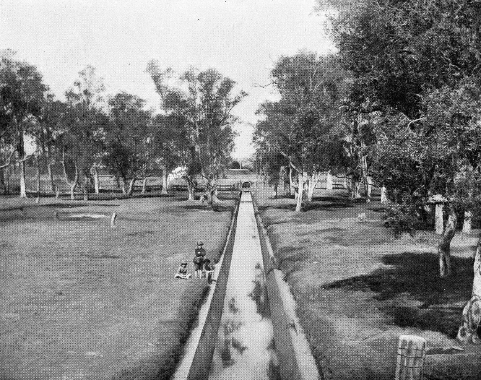 Children playing near storm drain, Milton - 1915