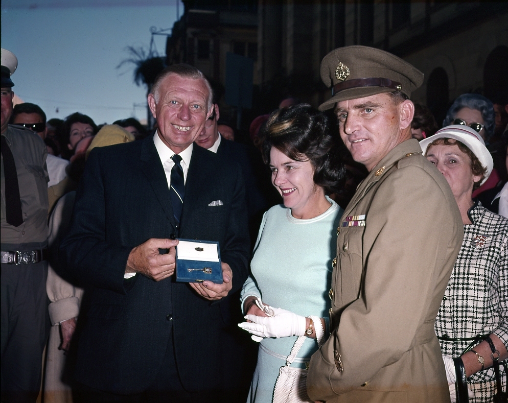 Lord Mayor Clem Jones Presenting Warrant Officer Keith Payne with the Keys to the City