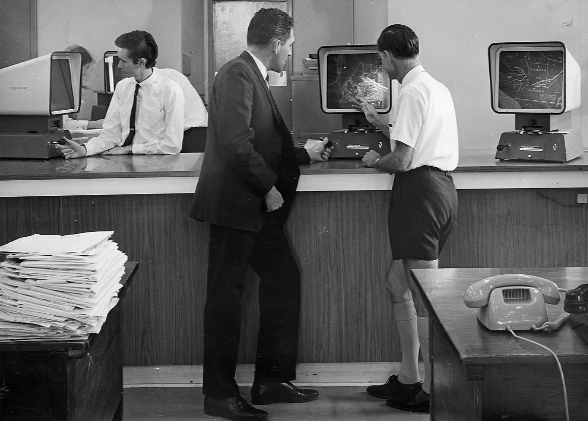 Brisbane City Council Staff reading Microfilm Cards - 1970