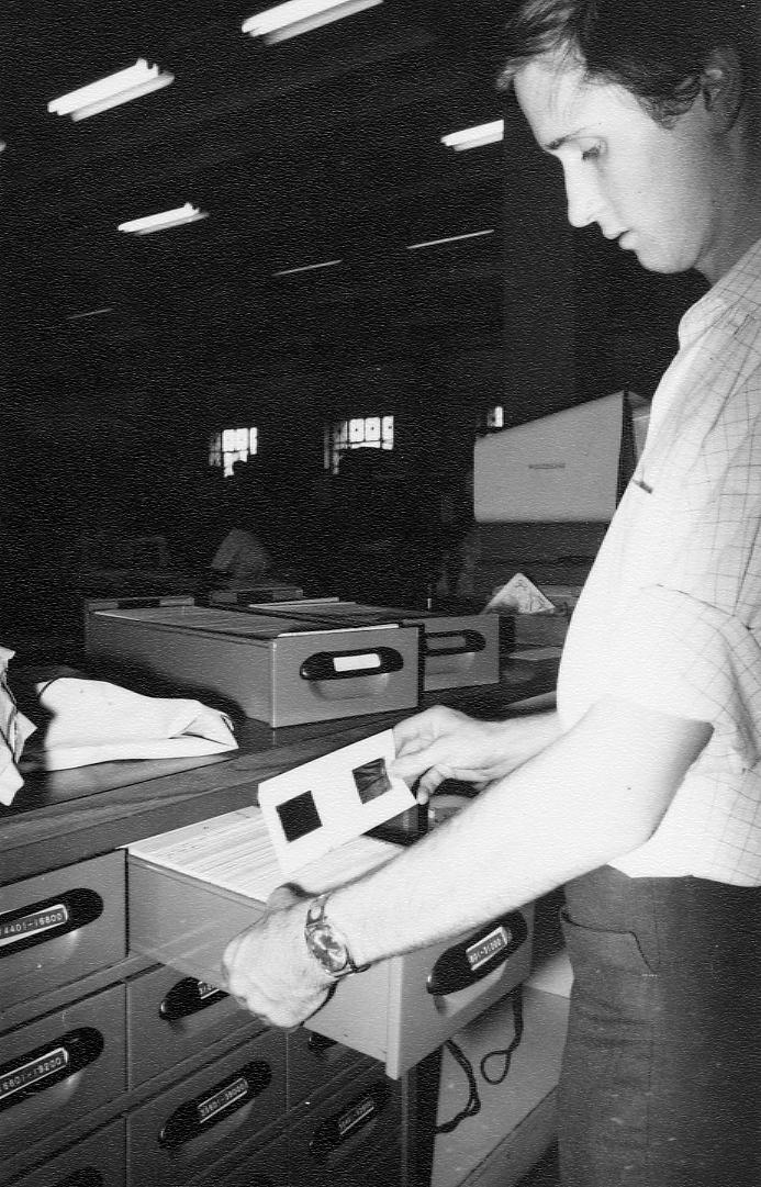 Brisbane City Council Staff Member filing Microfilm Cards