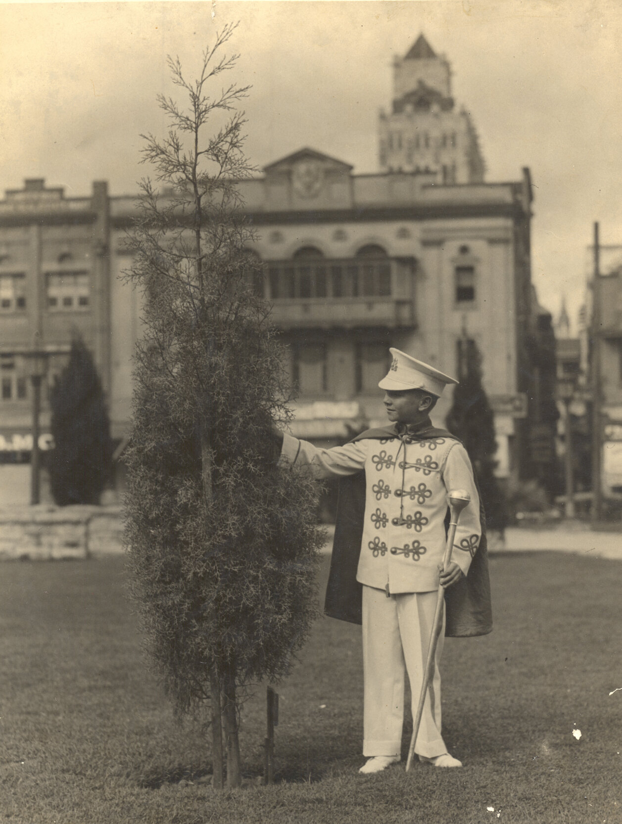 Charlie Stanton standing beside Tree he planted in Anzac Square - 1931