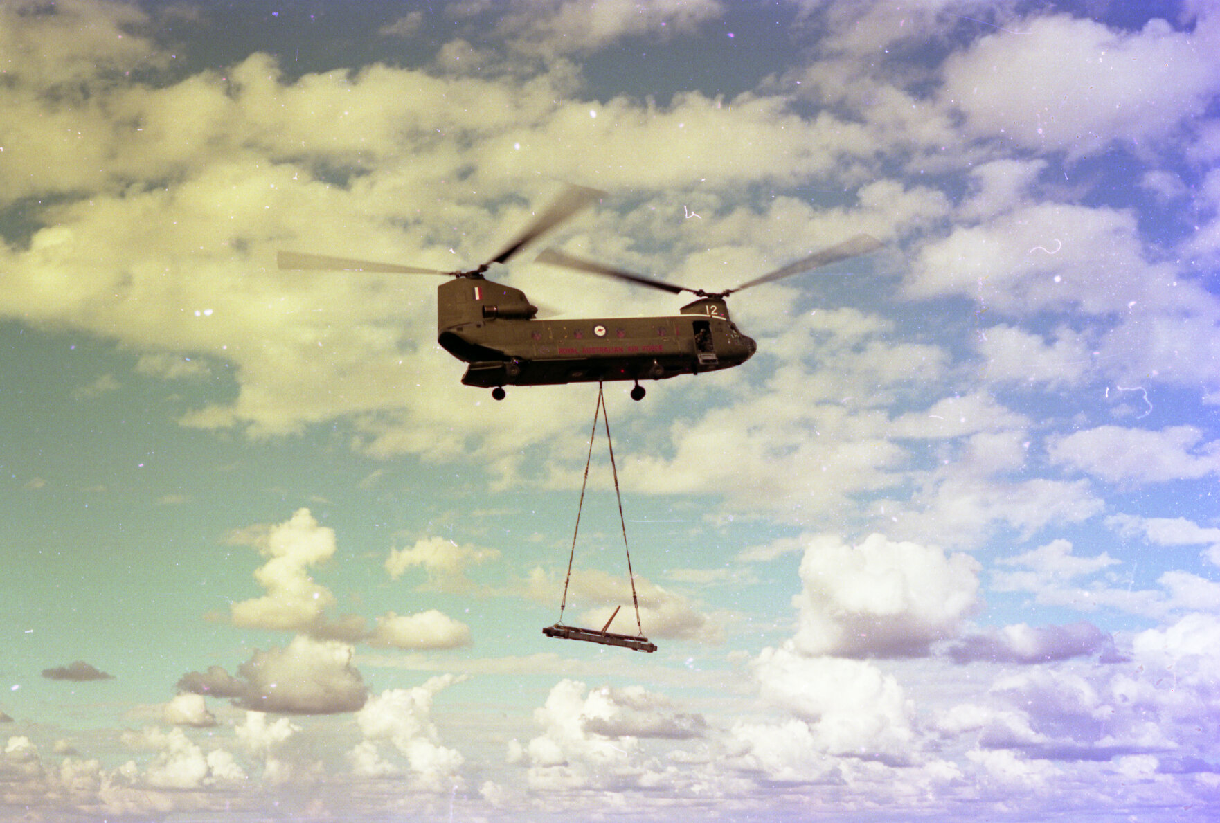 RAAF CH-47 Chinook lifting beam from sedimentation basin, Mt Crosby - 1975