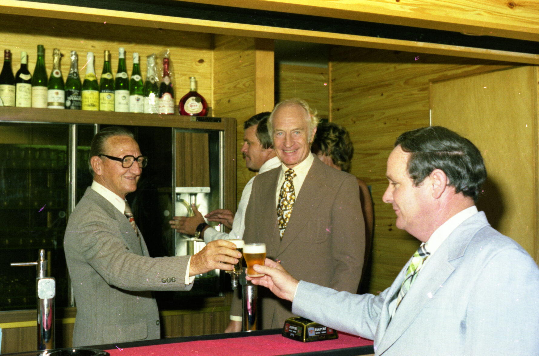 Lord Mayor Frank Sleeman and Alderman Brian Mellifont celebrate the opening of the Council Club with a beer in the Brisbane Administration Centre - 1977