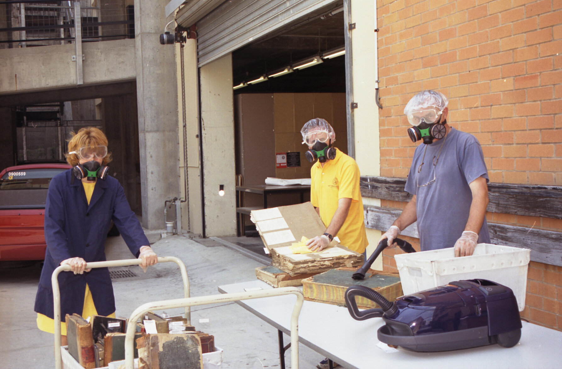 City Archives staff battling a mould outbreak at Macquarie Street, Teneriffe - 2002