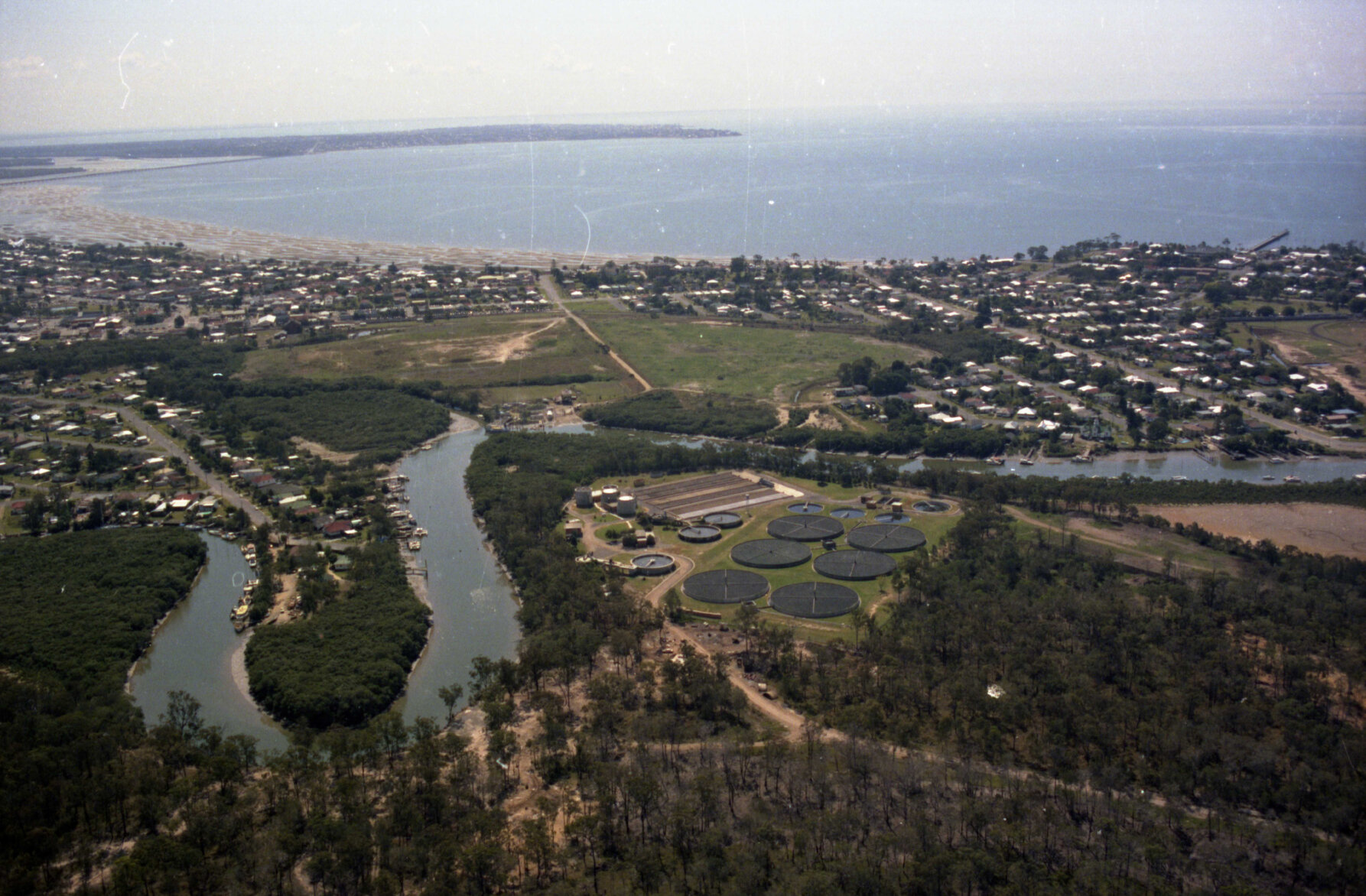 Aerial photo of Sandgate over Cabbage Tree Creek - 1986