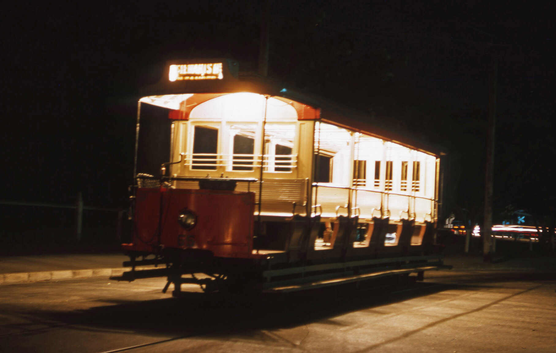 Toastrack style tram No. 65 at night - 1963