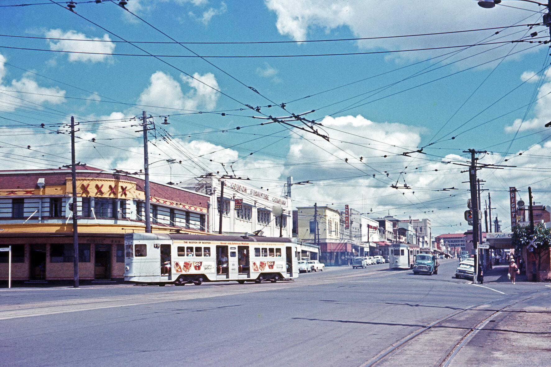 Trams No. 400 and No. 520 on Stanley Street, Woolloongabba, outside the Gabba Hotel - 1968