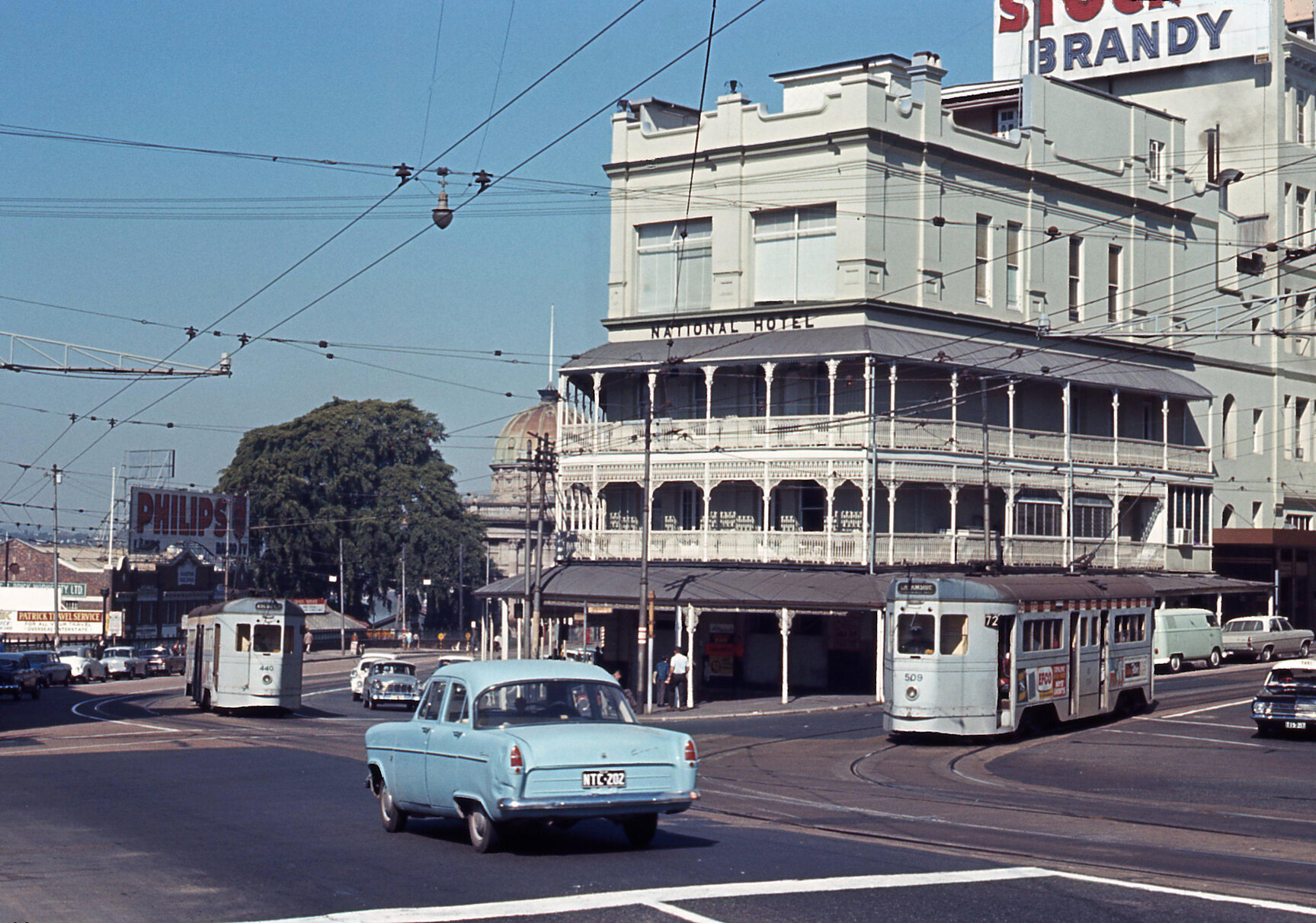 Trams No. 440 and No. 509 outside National Hotel and Customs House at corner of Adelaide Street and Queen Street - 1968