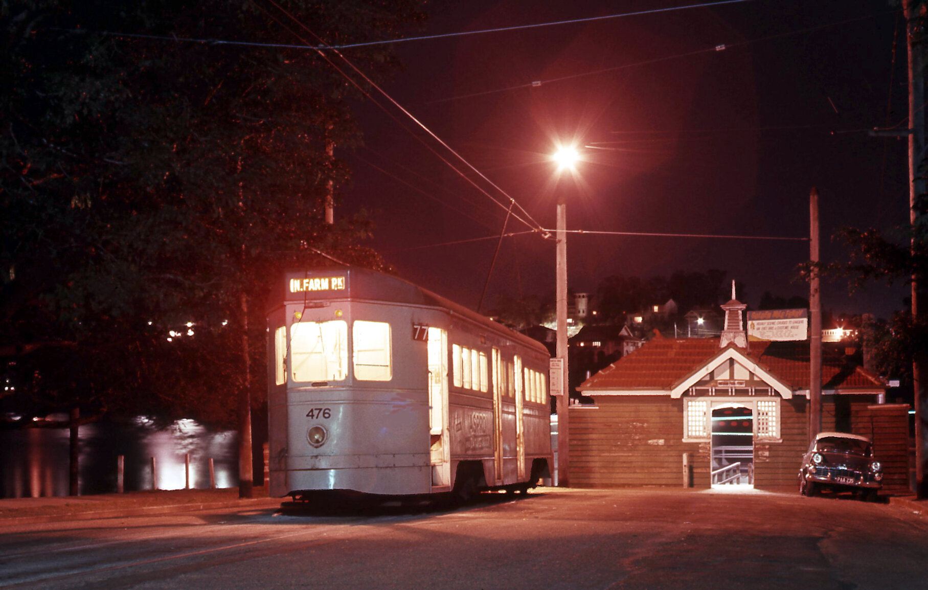Tram No. 476 at New Farm Park terminus at night with ferry terminal - 1968