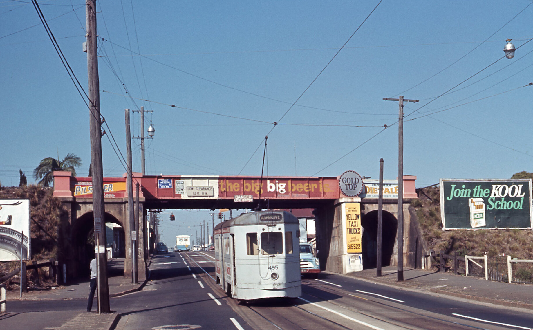 Tram No. 495 on Lutwyche Road, Windsor, under the railway bridge - 1968