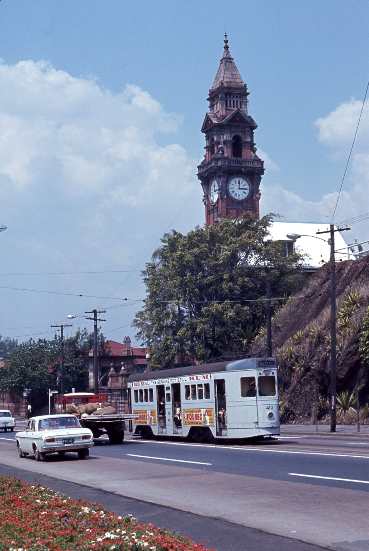 Tram No. 410 on Stanley Street with view of South Brisbane Town Hall clock tower - 1968