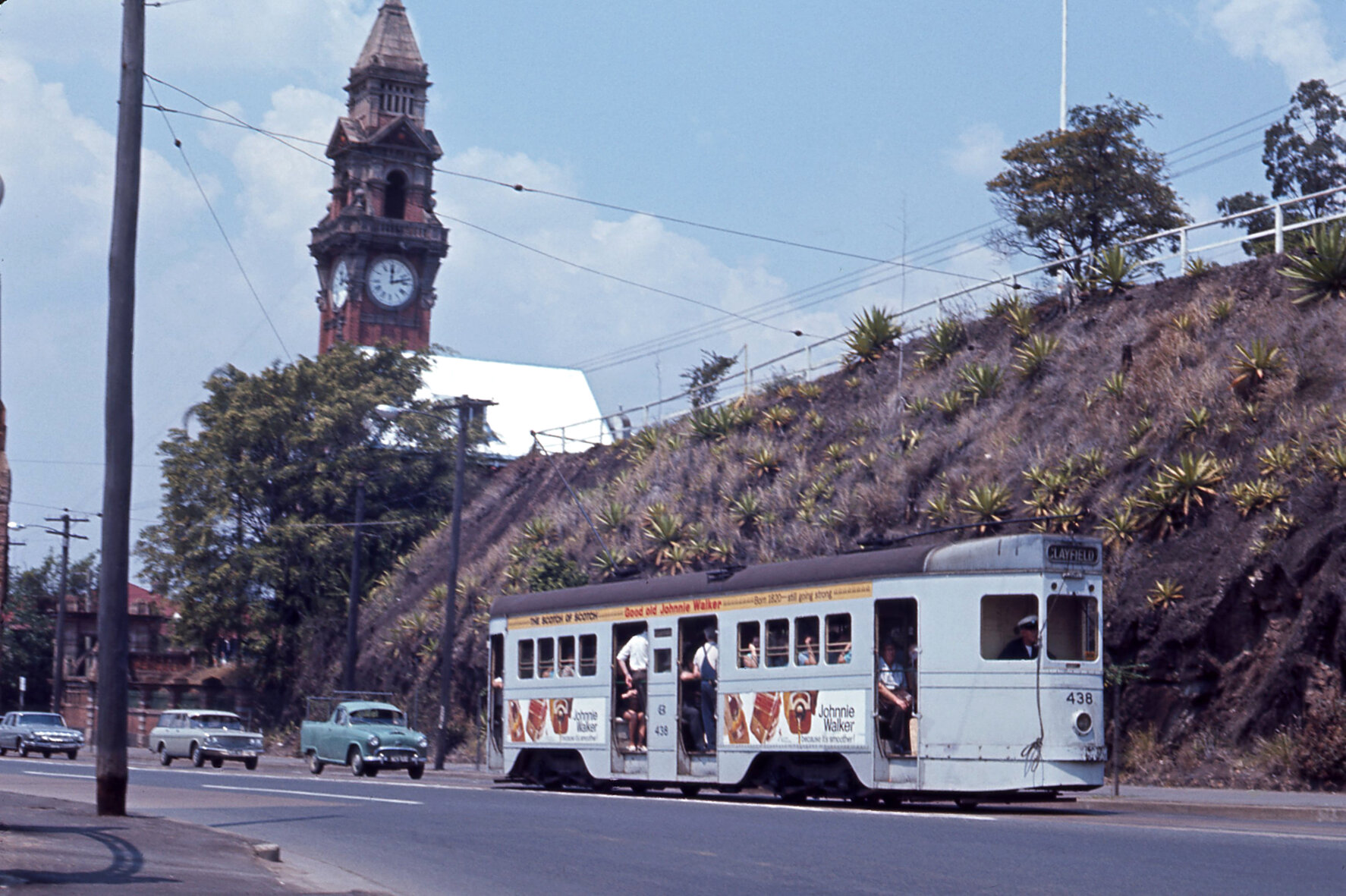 Tram No. 438 on Stanley Street with view of South Brisbane Town Hall clock tower - 1968