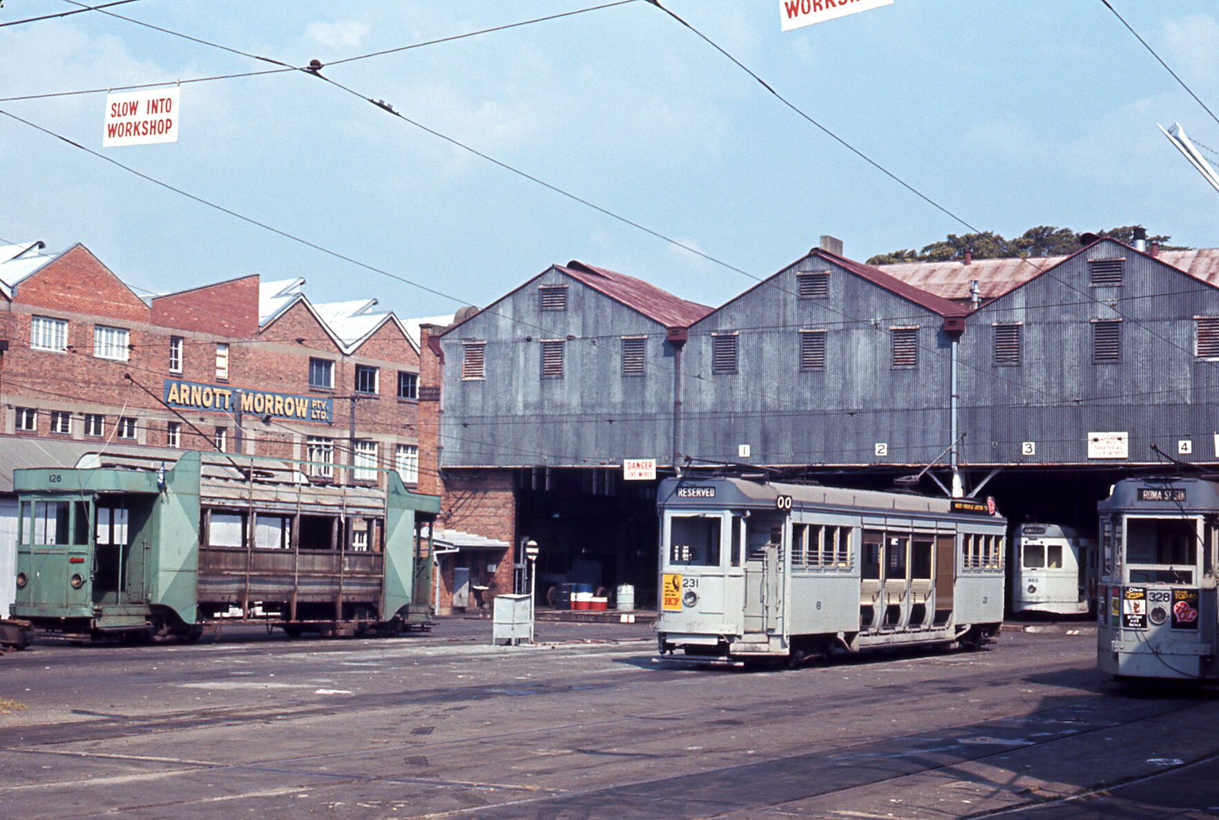 Trams No. 128, No. 231, No. 328, and No. 466 at Milton workshop - 1968