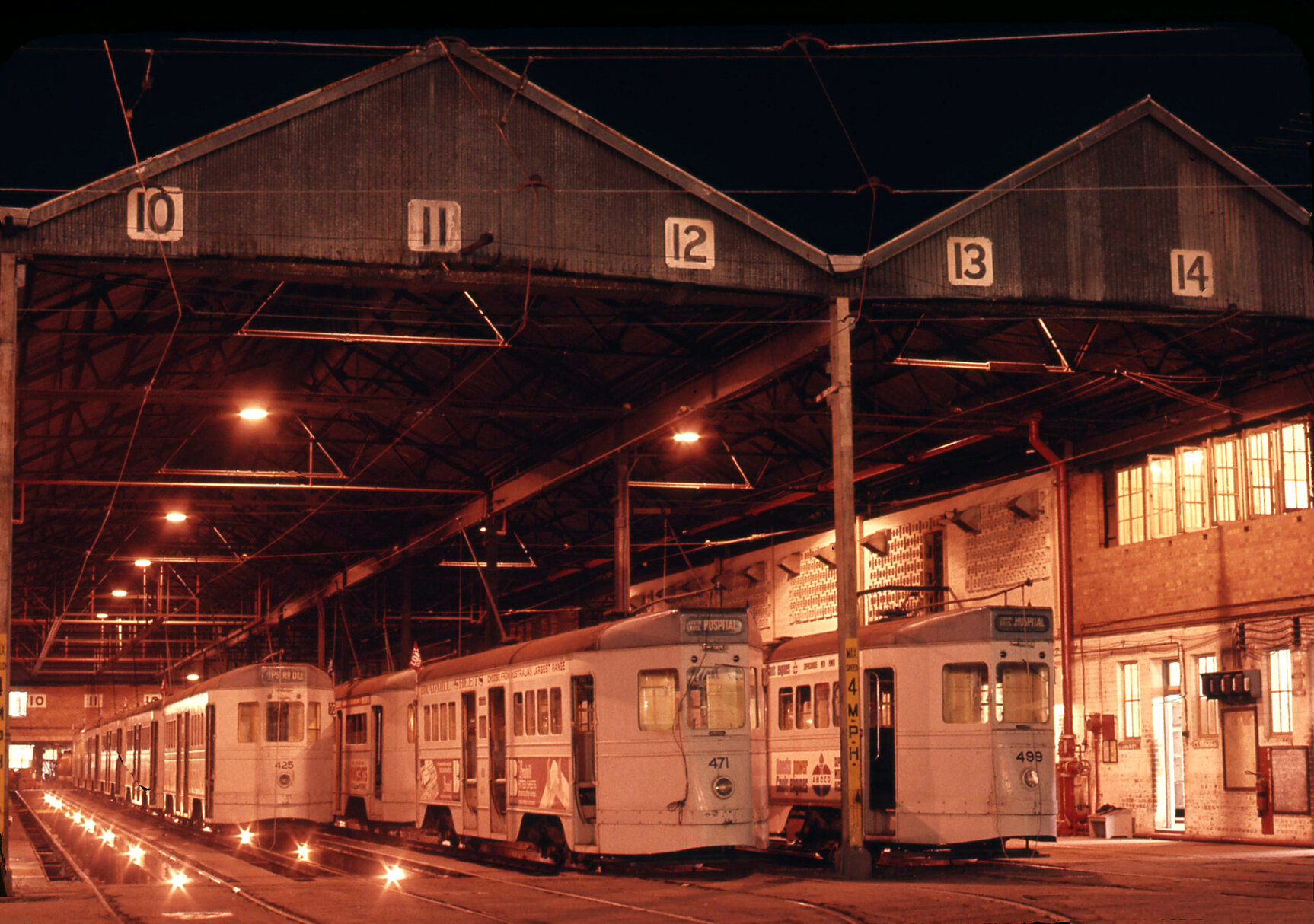 Night shot of trams No. 425, No. 471, and No. 499 at Annerley depot - 1968