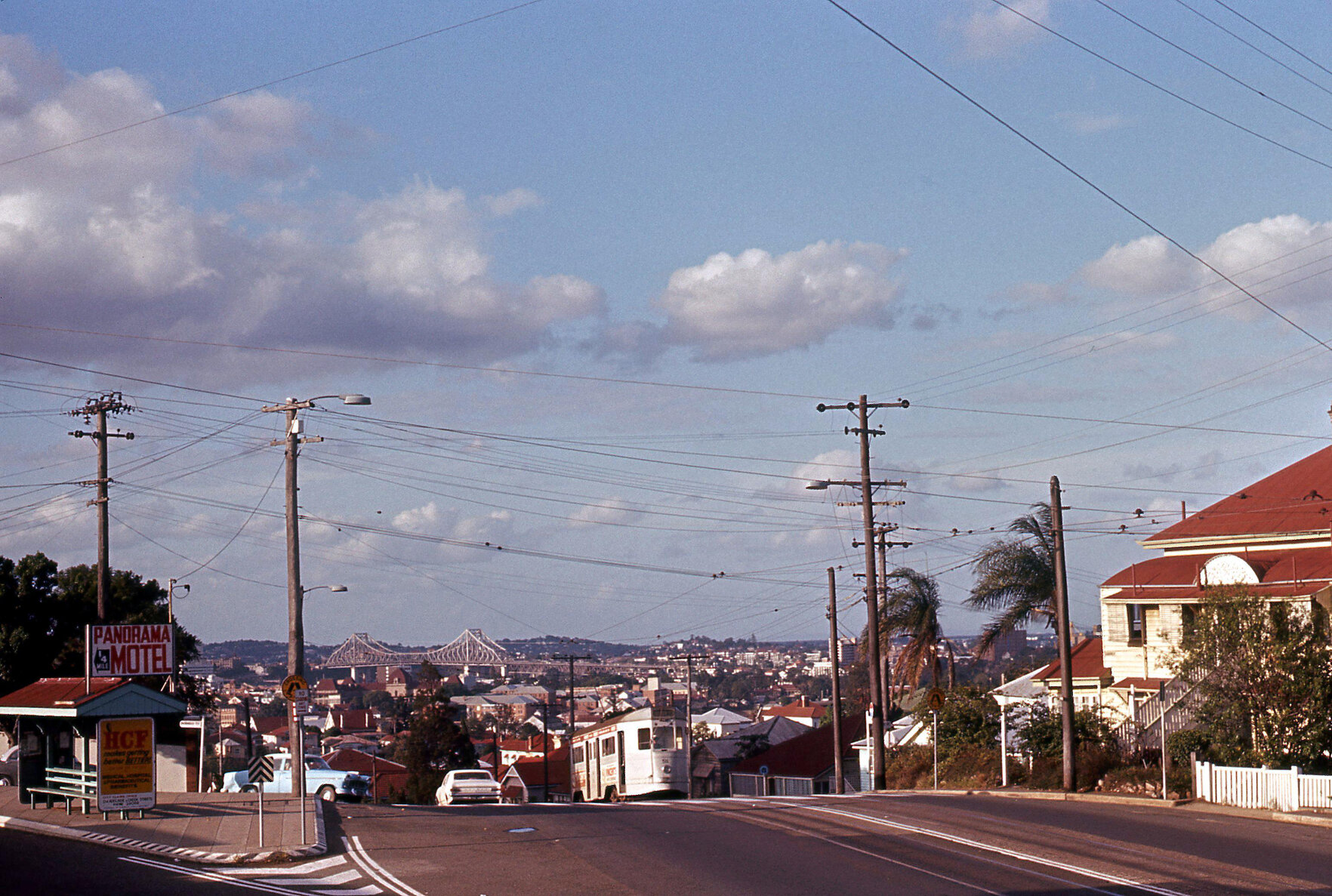 Tram No. 511 cresting hill on Gladstone Road, Highgate Hill - with Story Bridge in background - 1969