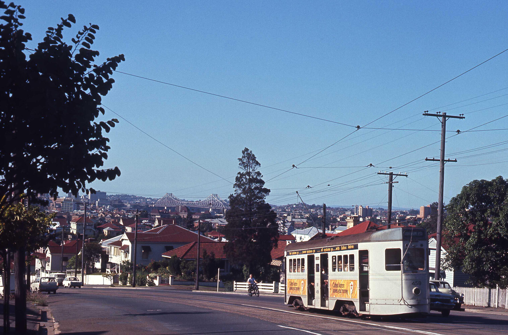 Landscape shot of tram No. 459 on Gladstone Road, near Emily Street, looking towards the Story Bridge, Highgate Hill - 1969