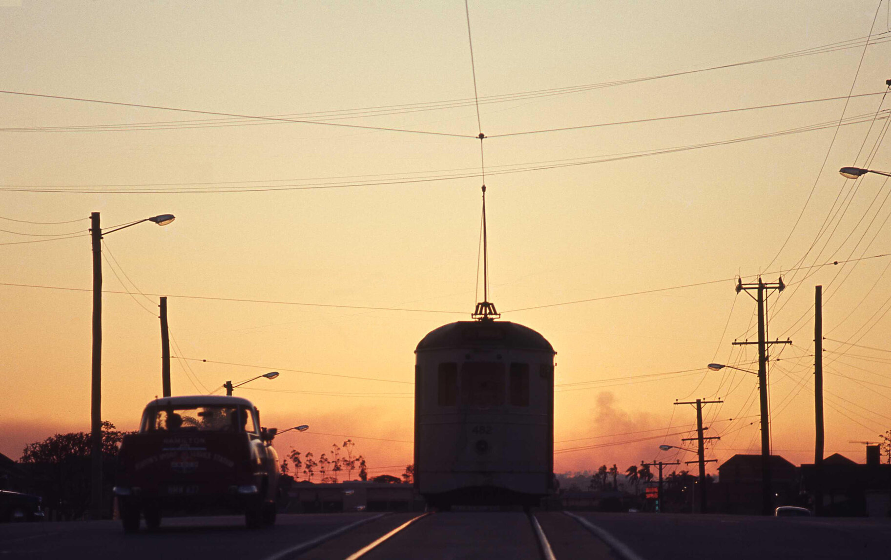 Shot of tram No. 482 on O'Keefe Street at sunset, Woolloongabba -1969