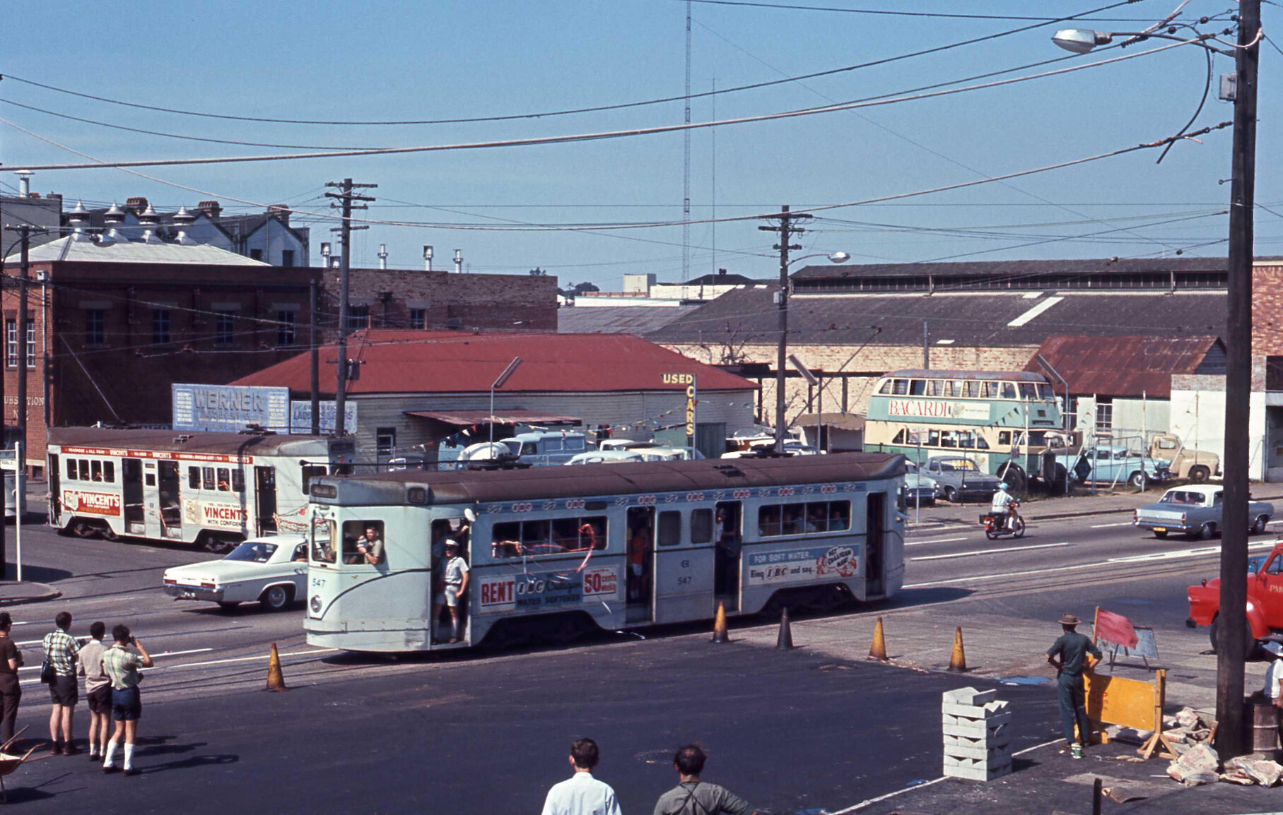 Trams No. 547, No. 412 and No. 531 at corner of Russell Street and Grey Street, South Brisbane - 1969