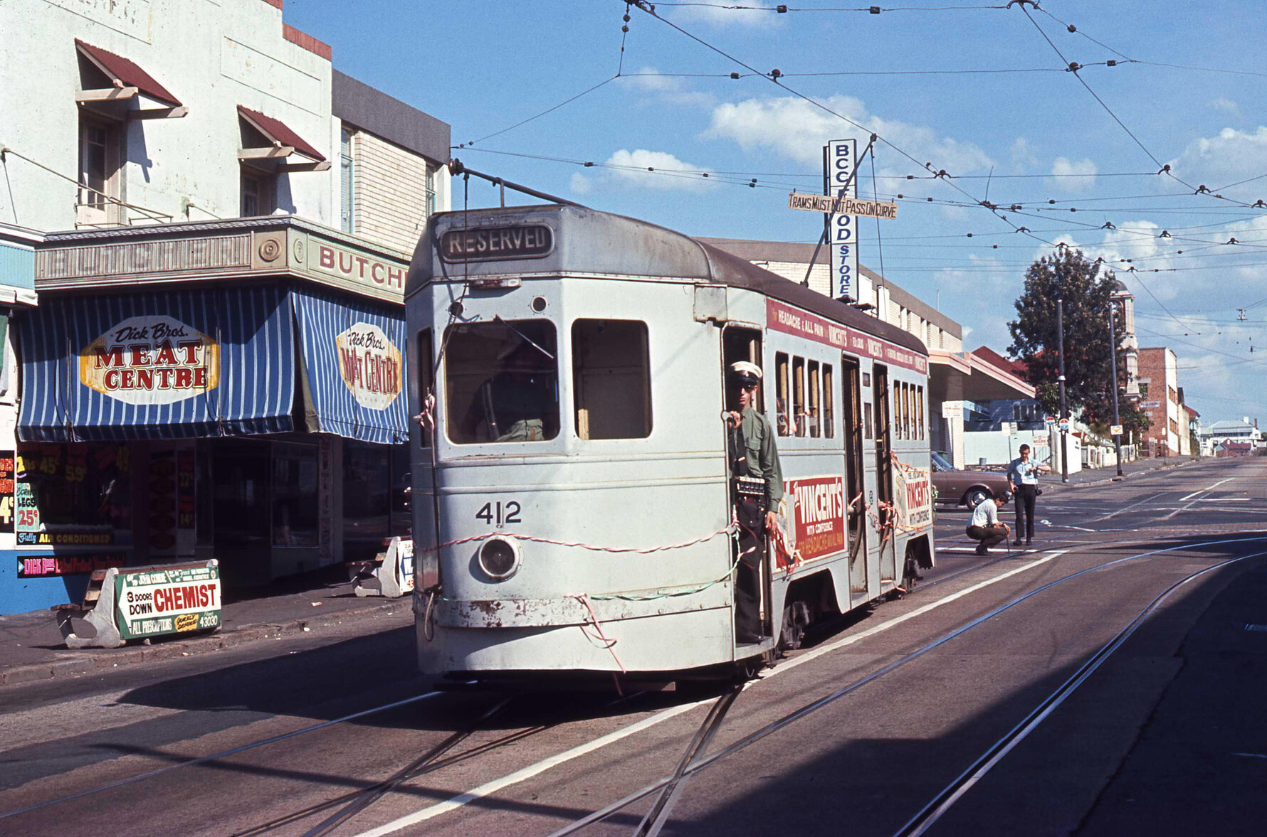 Tram No. 412 with ribbons on Boundary Road near Vulture Street, West End - 1969