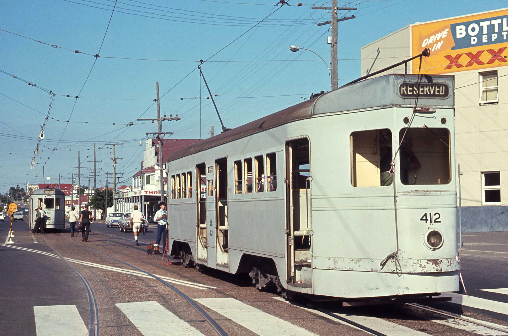 Tram No. 412 and No. 531 on Old Cleveland Road outside Stones Corner Hotel - 1969