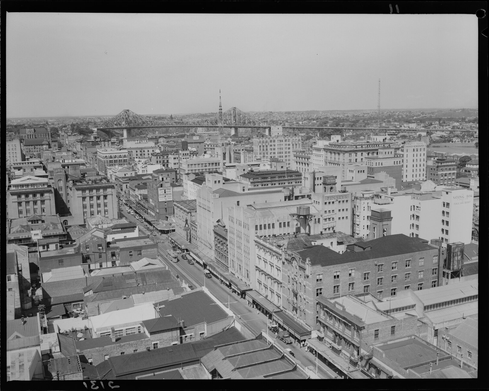 View from City Hall Tower, looking towards Story Bridge down Adelaide Street with trams, Brisbane City - 1952