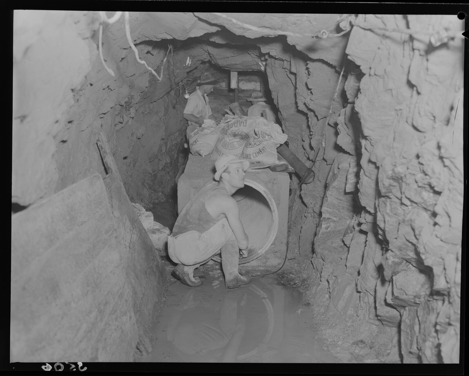 Laying 66" water main in Cameron's Crossing - Mt Crosby - 1953