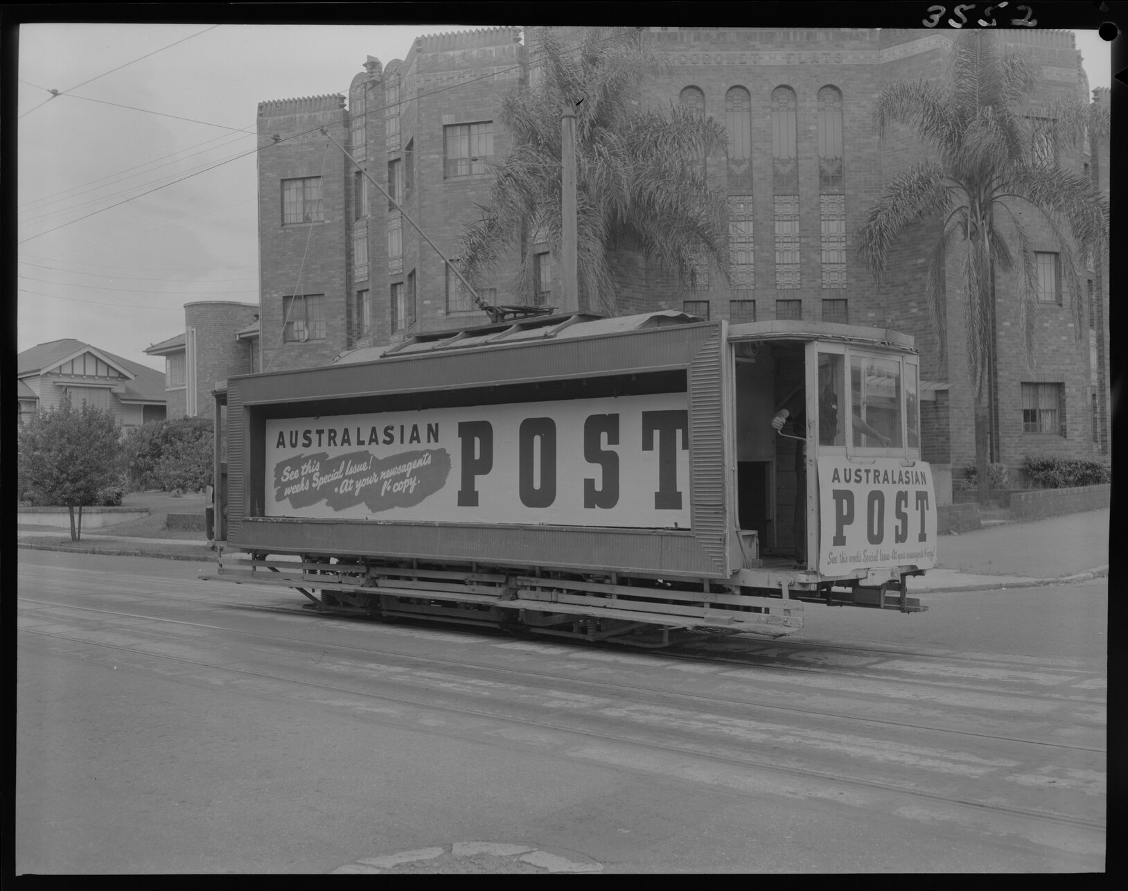 Advertising Tram for Australasian Post outside of Coronet Flats, Brunswick Street, New Farm - 1953