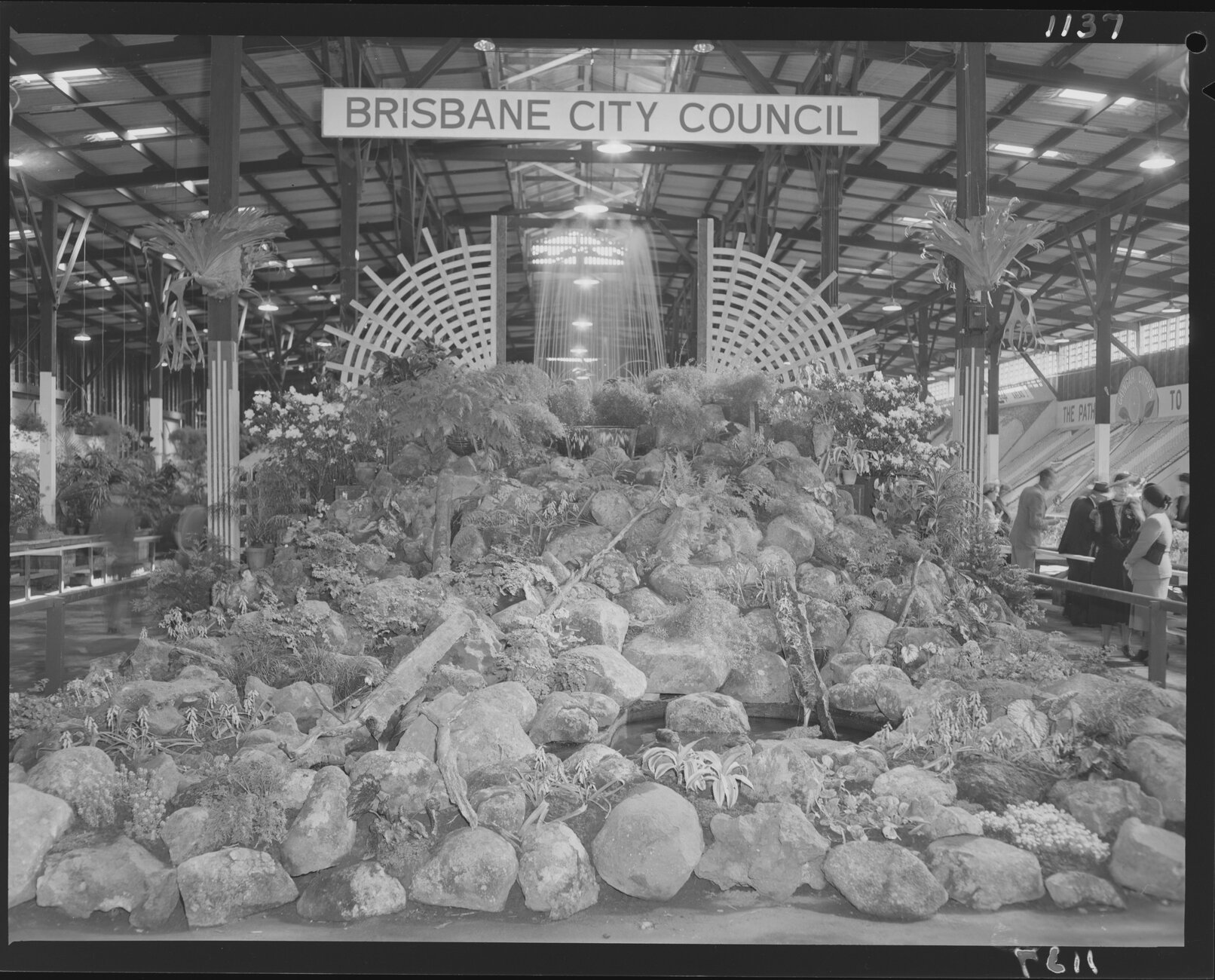 Brisbane City Council Parks Department display at Exhibition (Ekka) with rocks, plants and fountain - 1950