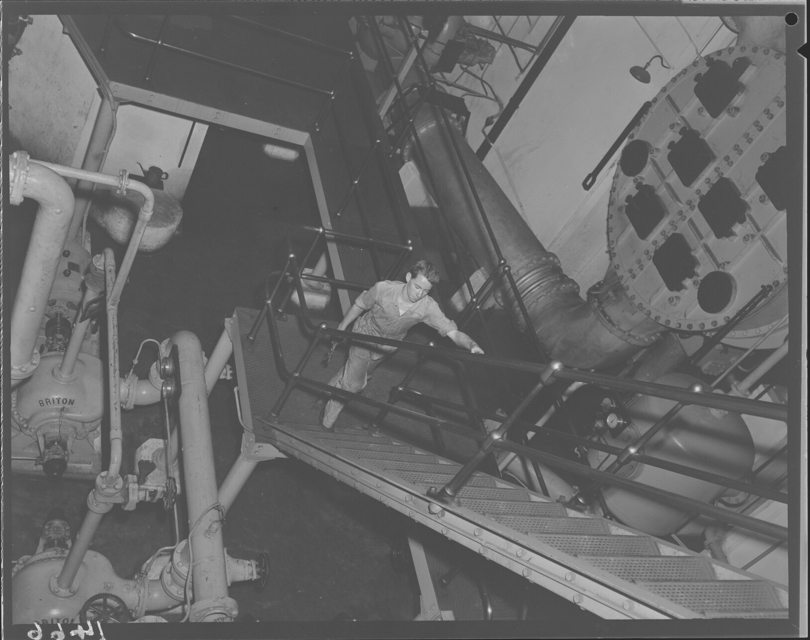 Young man working at New Farm Powerhouse - 1950