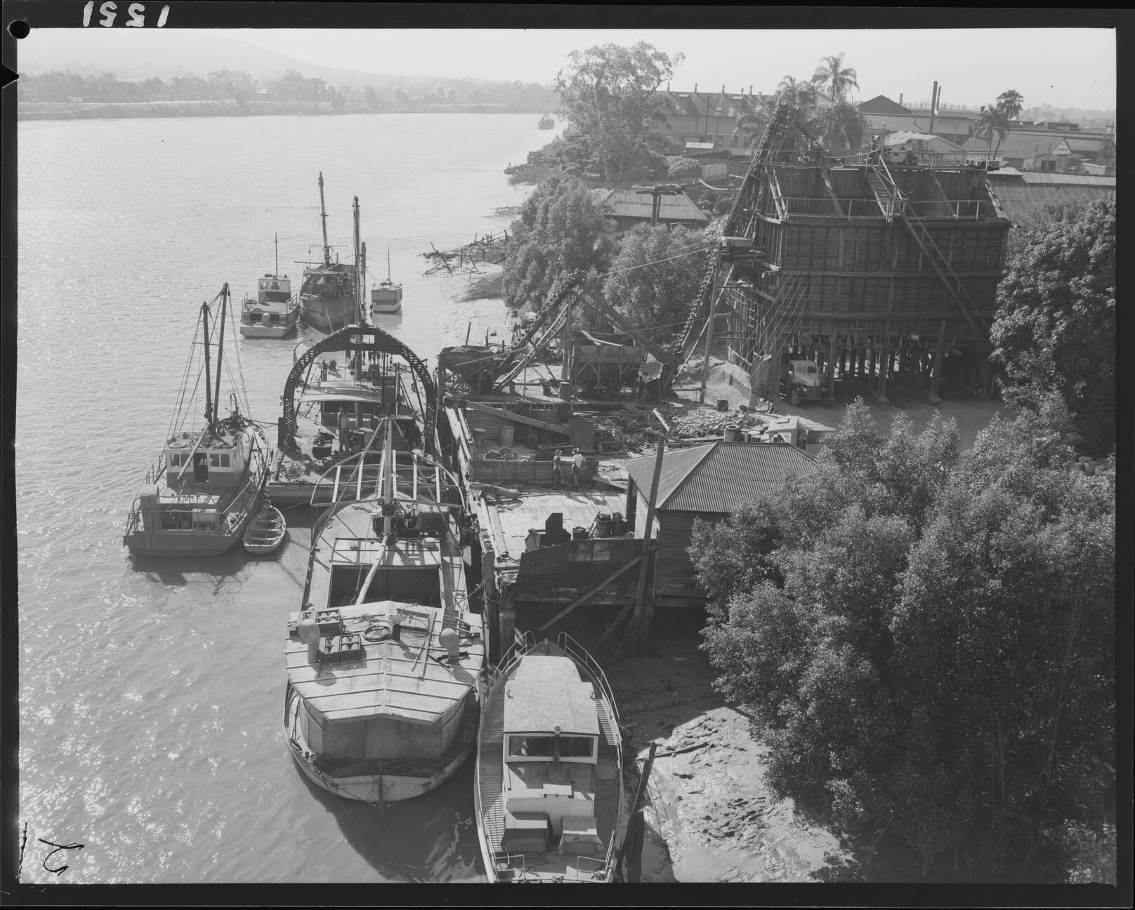 Construction on south river bank with crane barge, photo taken from William Jolly Bridge, South Brisbane - 1951