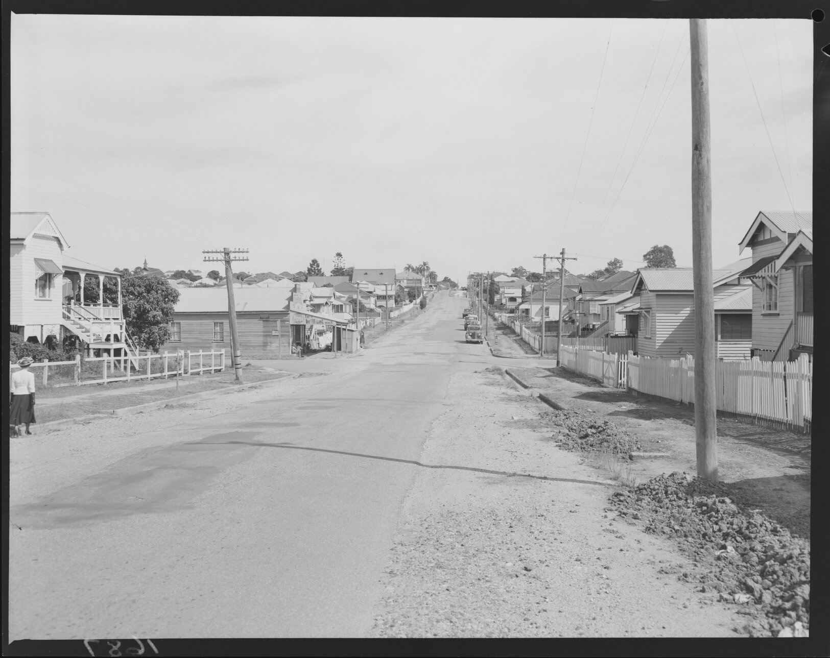 Houses on Logan Road prior to tram extension, possibly Greenslopes - 1951
