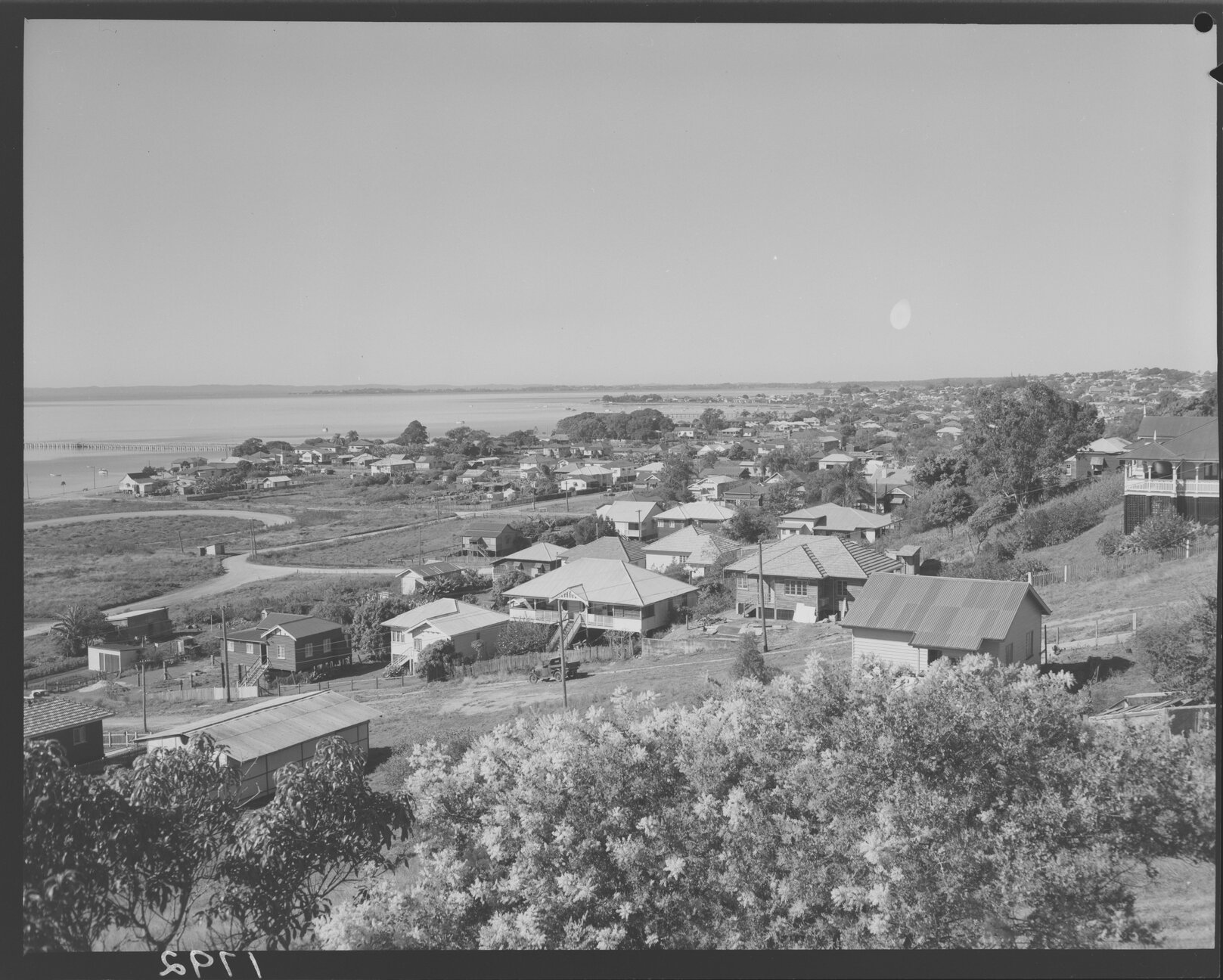 View of Wynnum from Prospect Street looking south over the bay - 1951