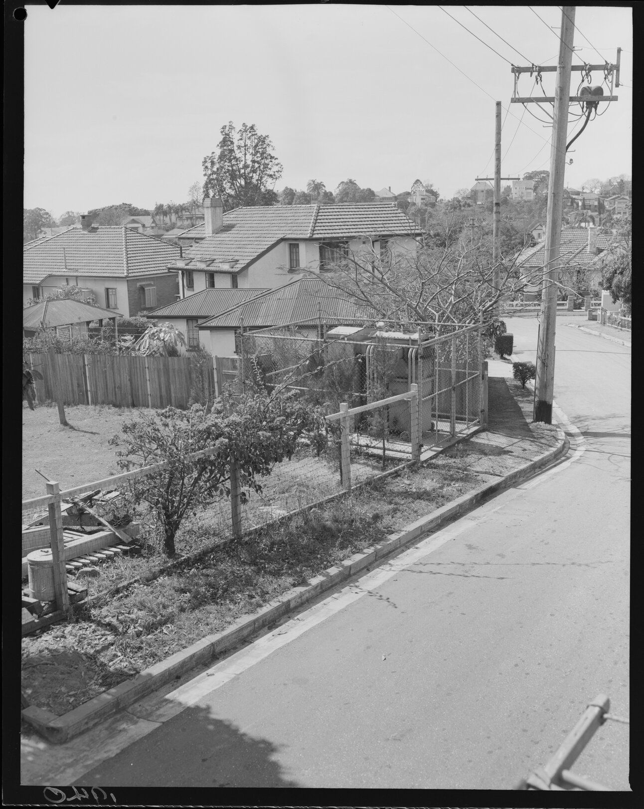 Electricity transformer in yard at Hamilton, 1951