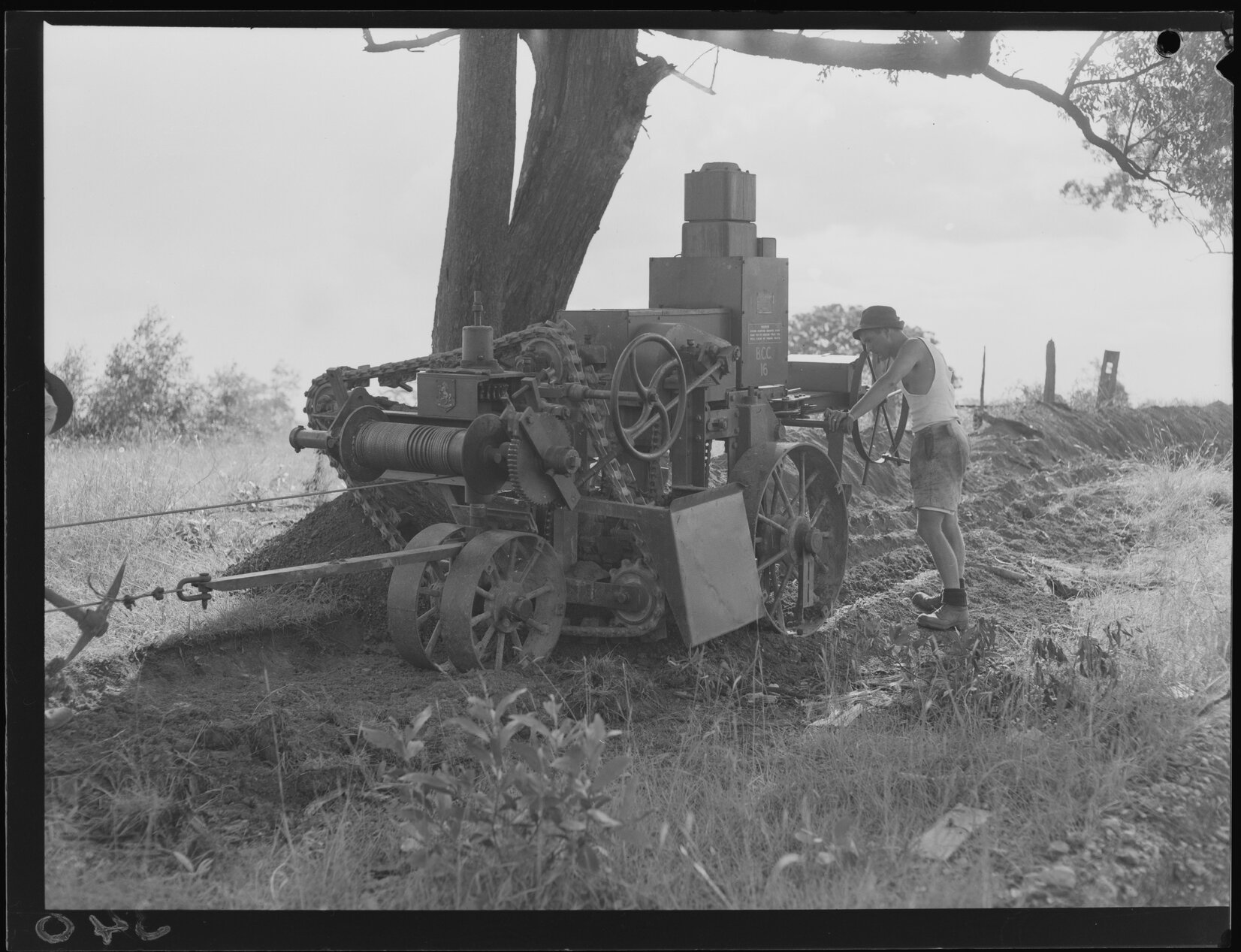 Worker excavating for small mains  - 1949