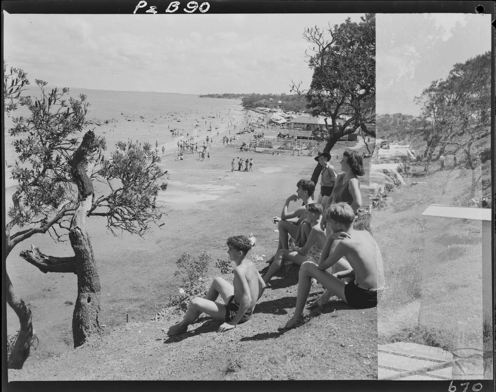 Teenagers on hill overlooking Sutton's Beach at Redcliffe - 1948