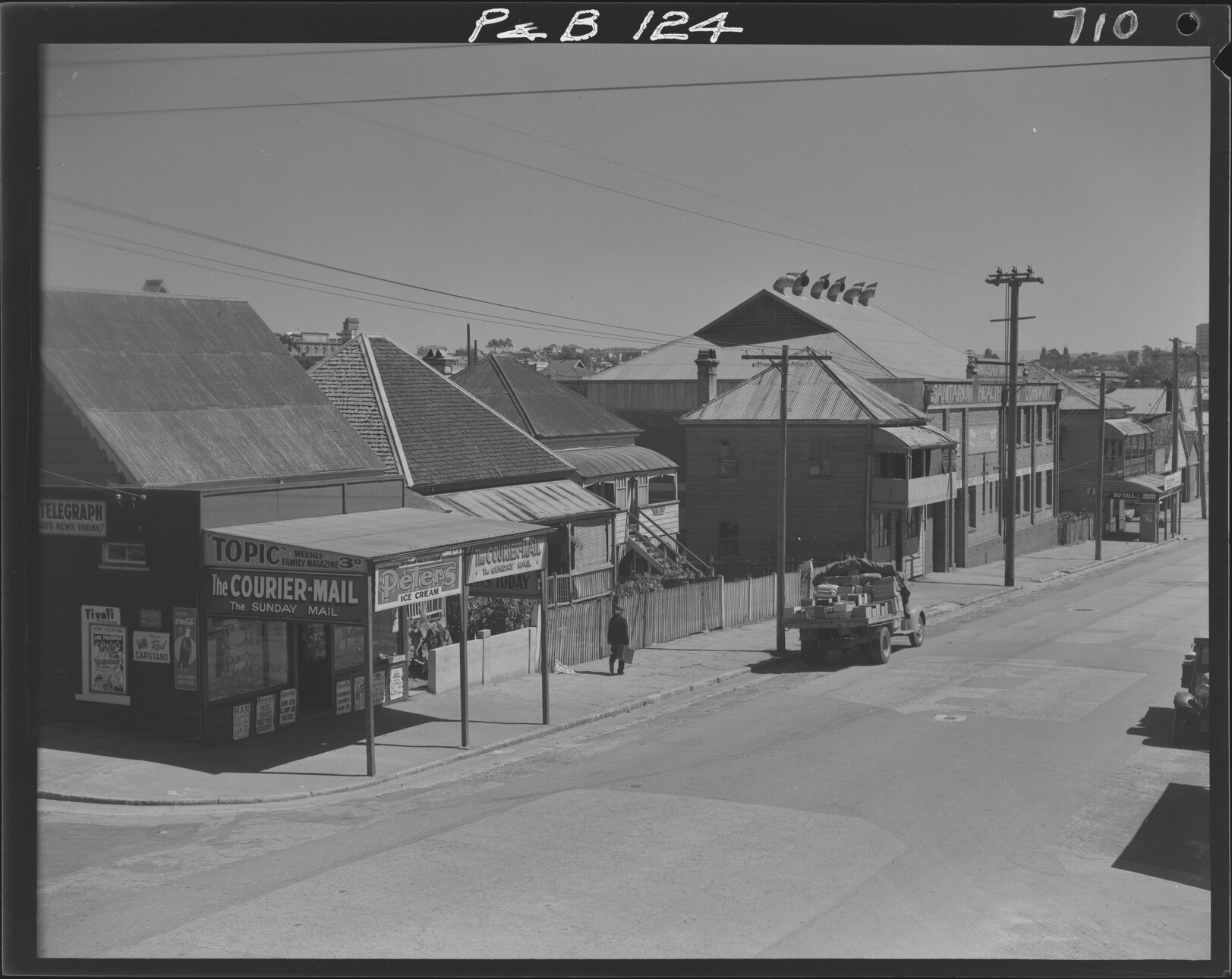 View of houses and corner shop on James Street in Fortitude Valley - 1948
