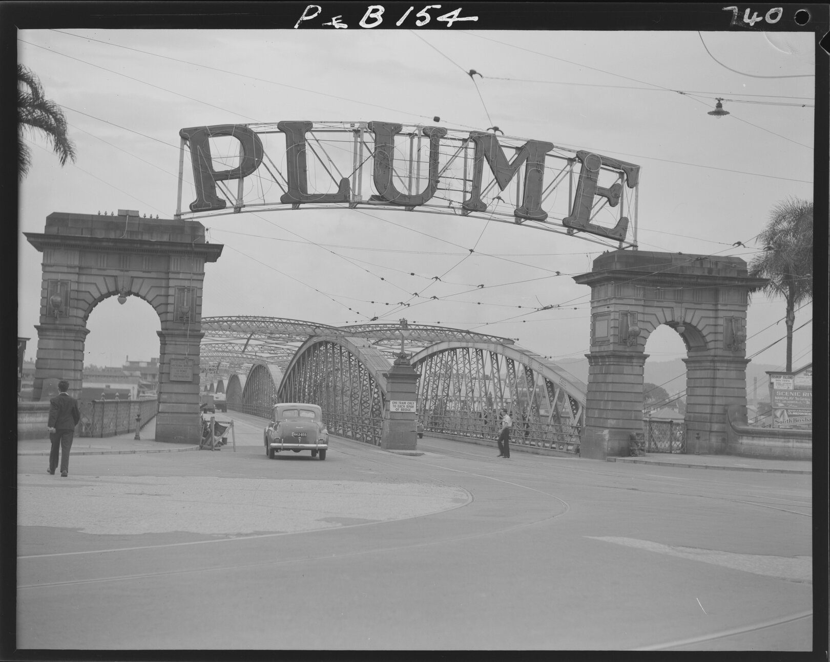 Victoria Bridge entrance with Plume advertisement - 1948