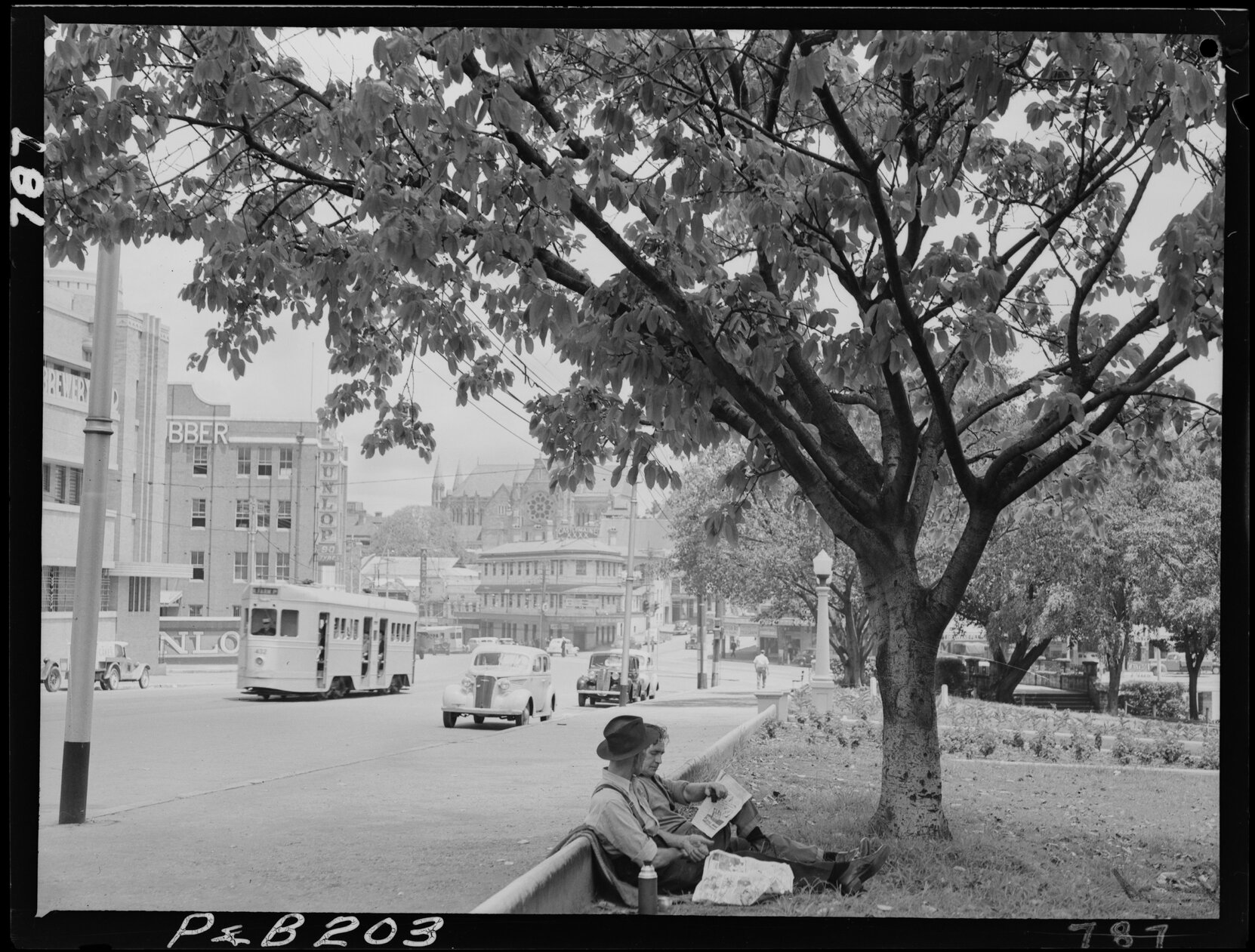 View from Centenary Place Park towards St John's Cathedral with tram No. 432, Fortitude Valley - 1948