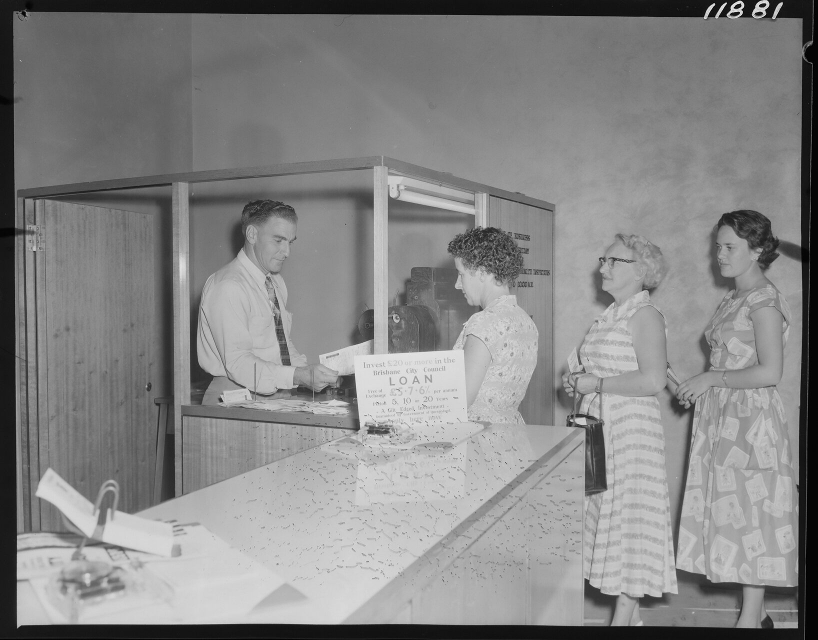 Women lining up at Administration Centre, Wynnum - 1959