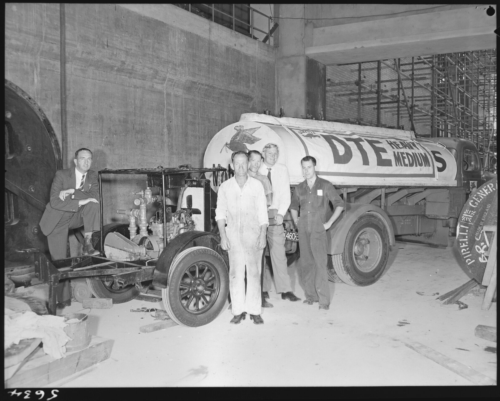 Workers at Tennyson Powerhouse with fuel truck - 1955