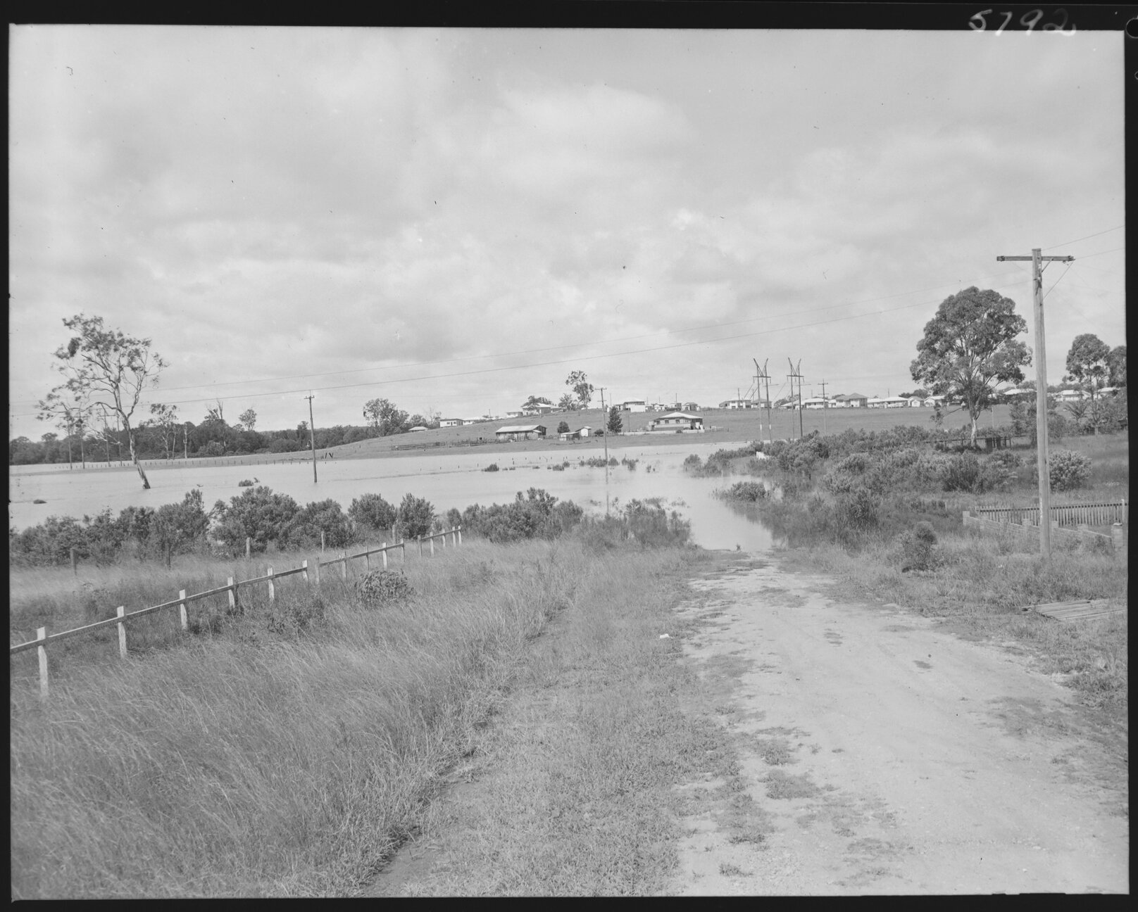 Flooded road, Oxley - 1955