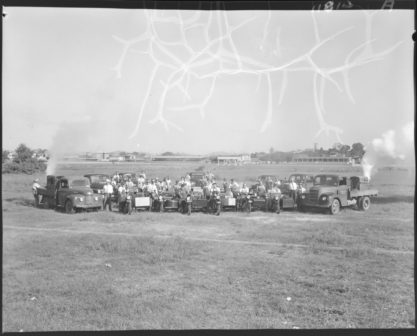 Moquito control workers and vehicle fleet at Eagle Farm racecourse - 1959