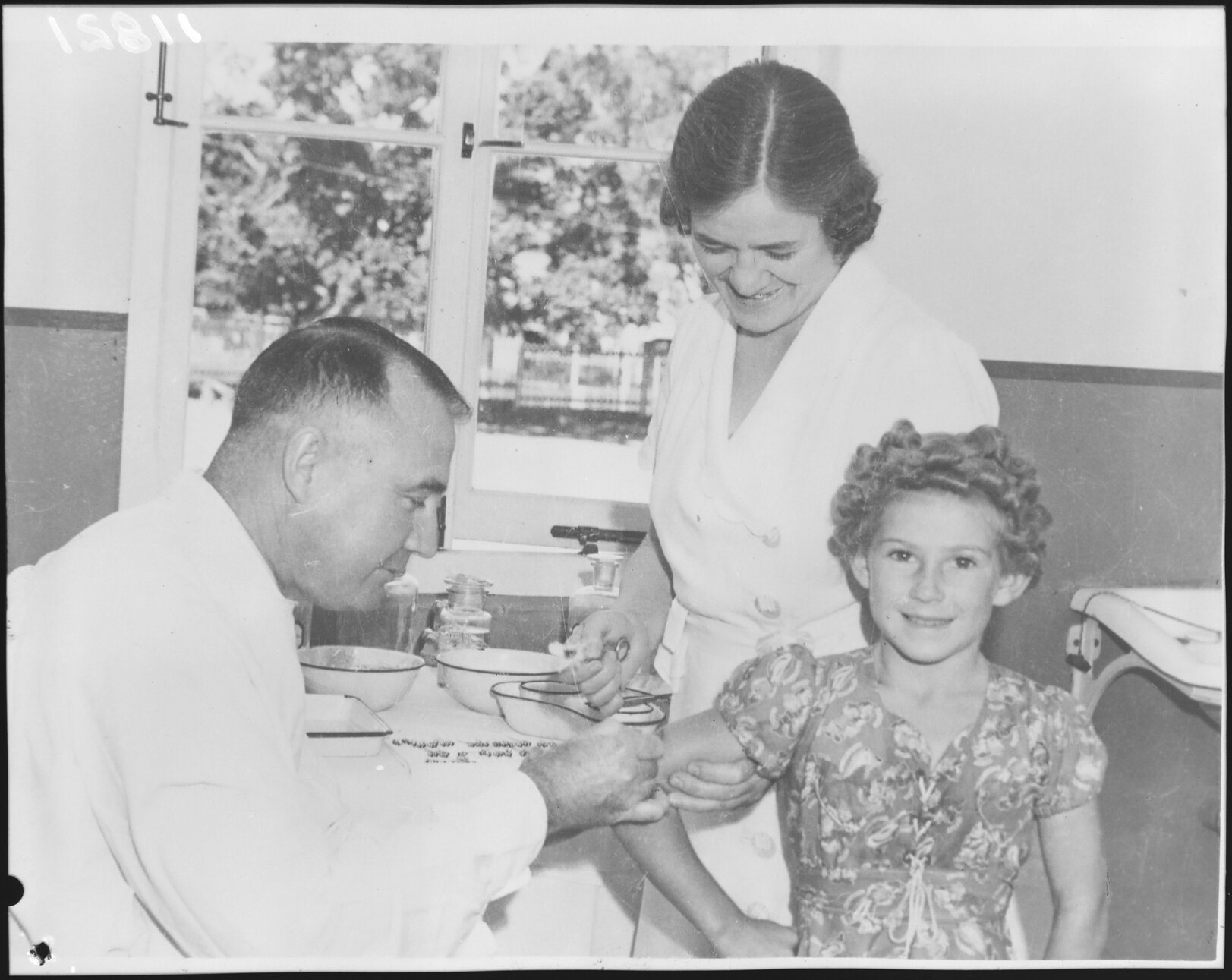 Immunisation program at City Hall with young girl