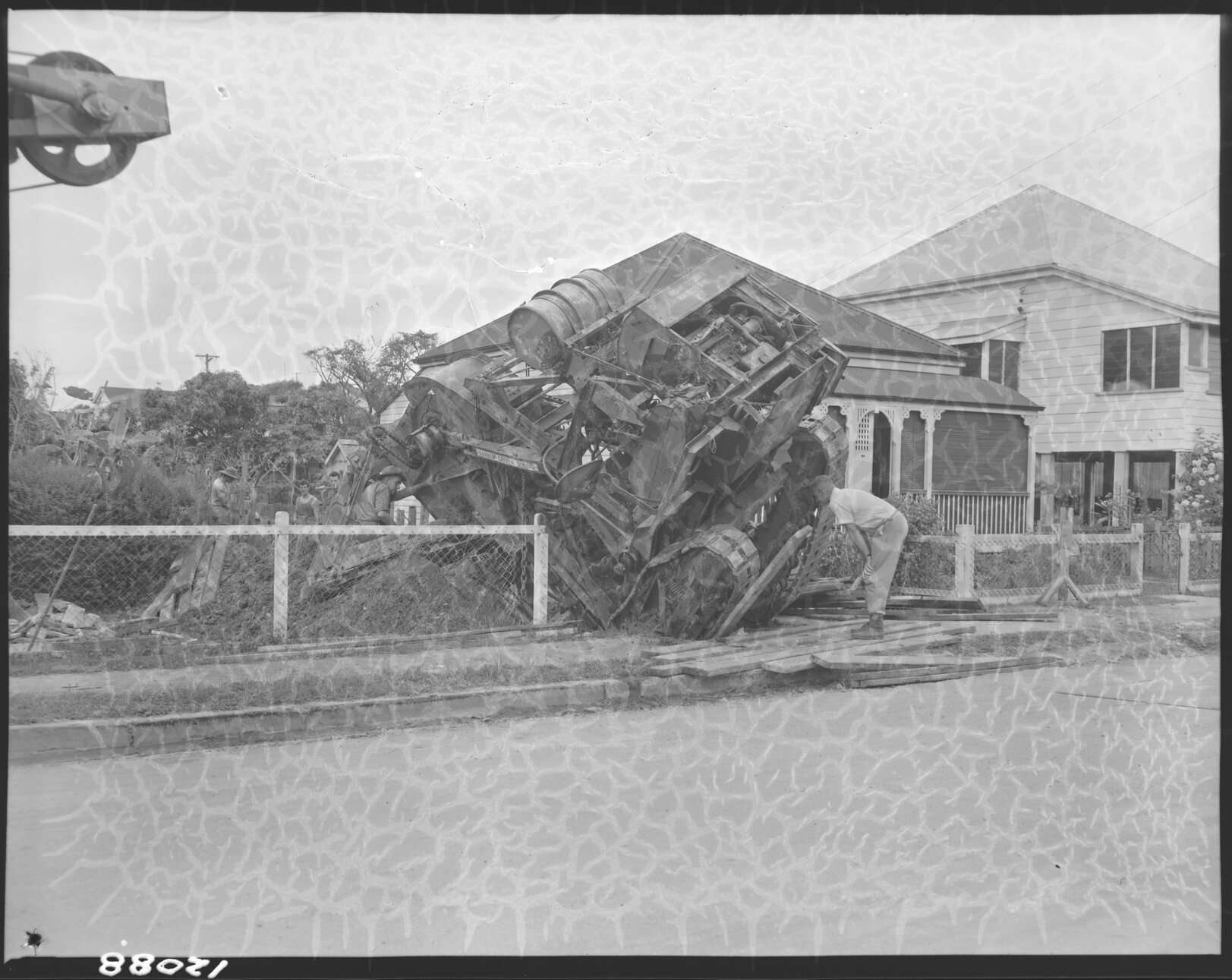 Excavator tipped over into pit, Nundah - 1959