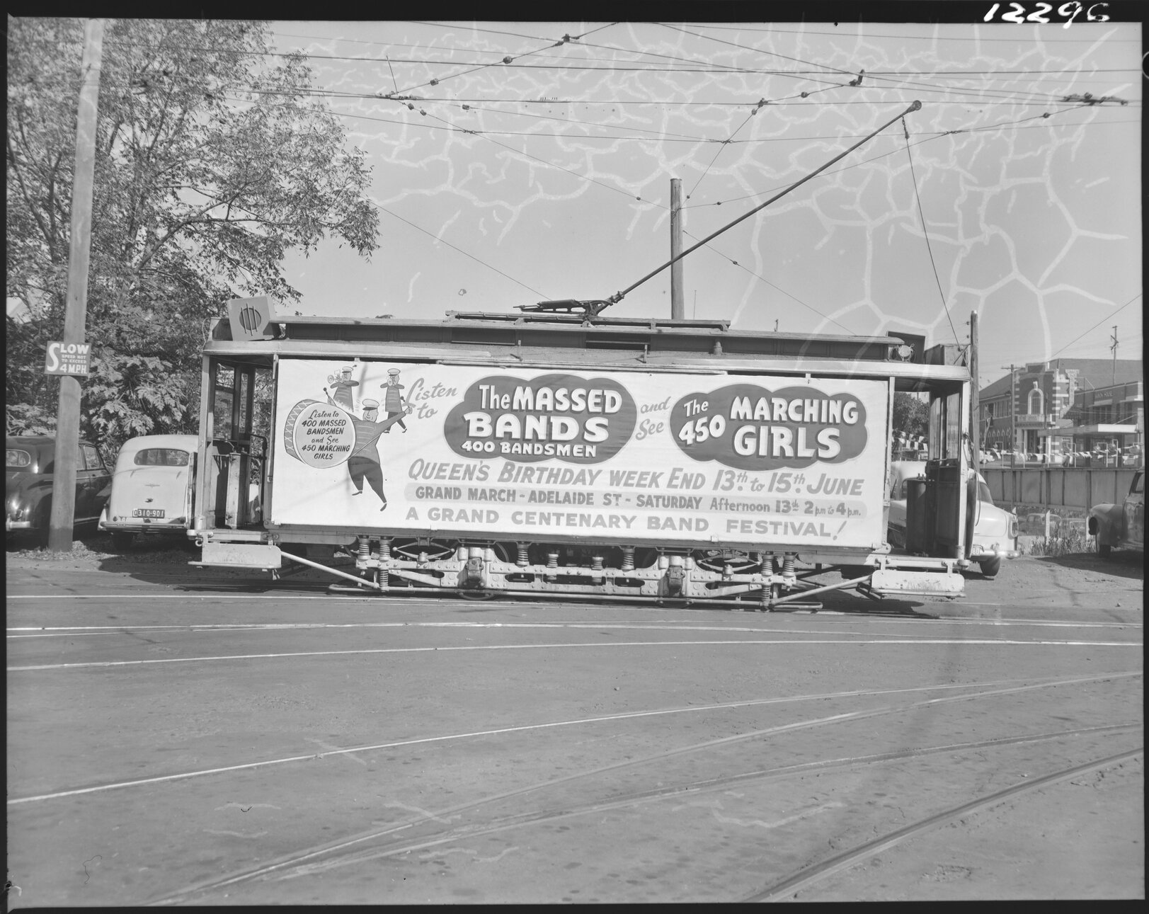 Trams advertising marching band event - 1959