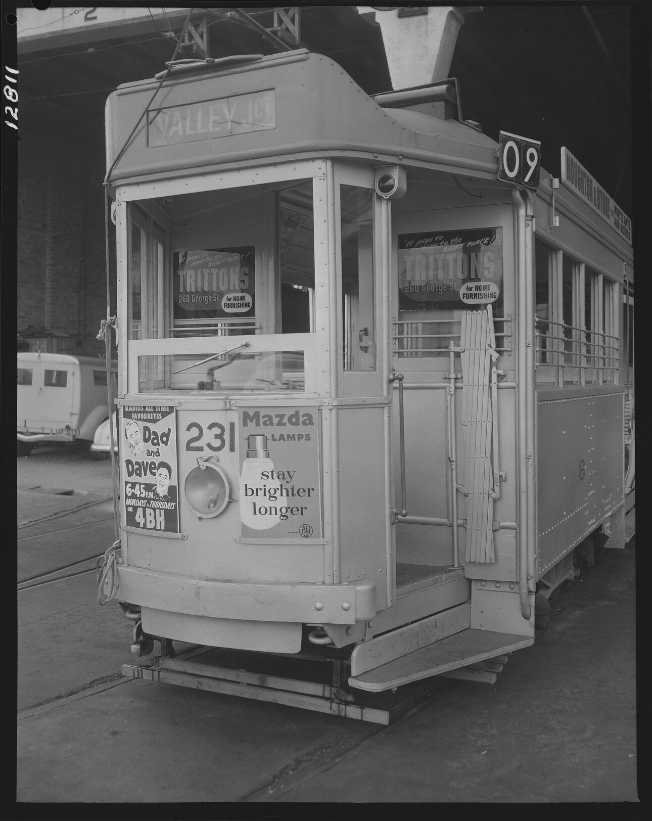 Tram No. 231 advertising Mazda lightbulbs and the Dad and Dave radio show - 1959