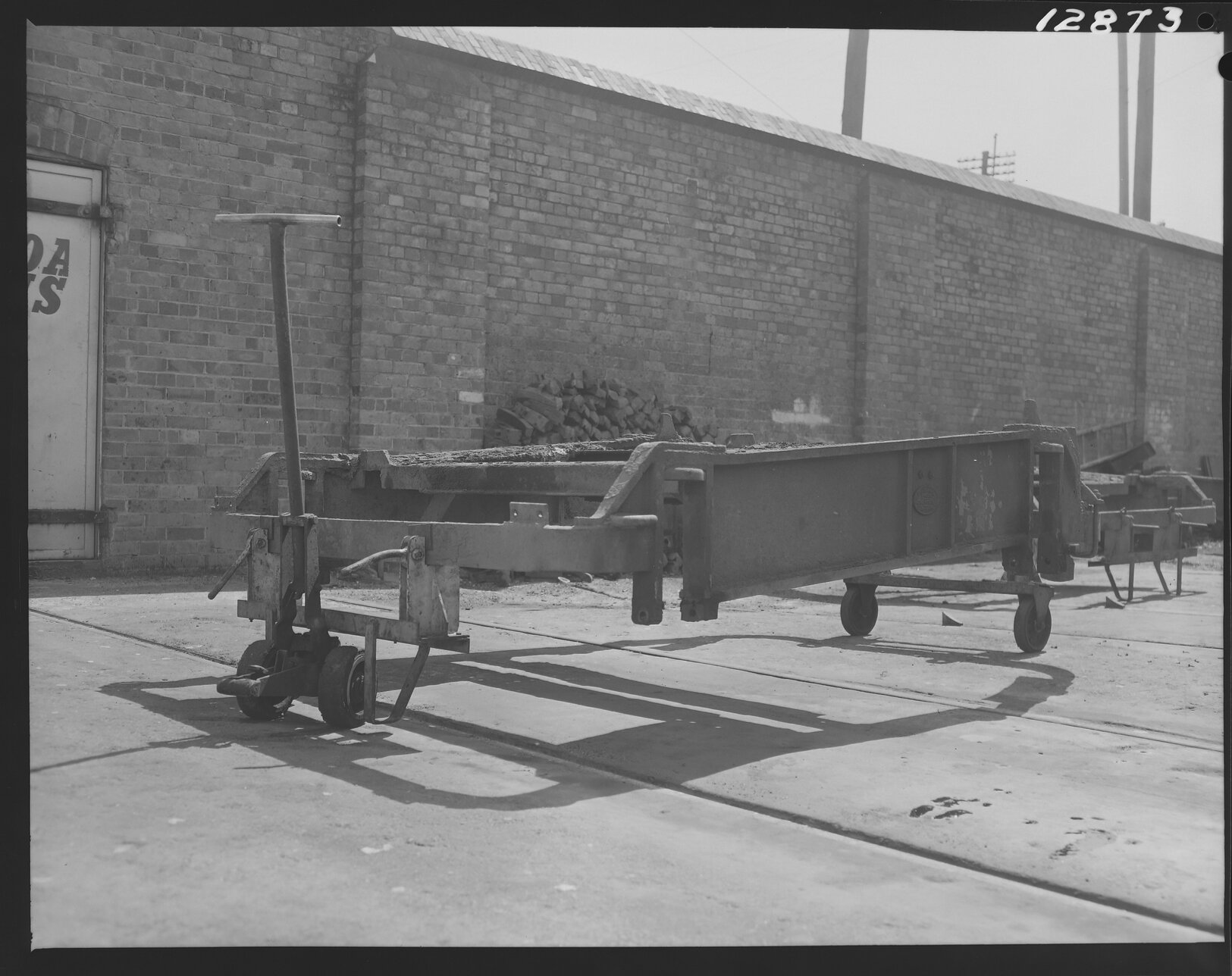 Rusted tram truck/bogey (chassis) at Milton Depot, Boomerang Street - 1959
